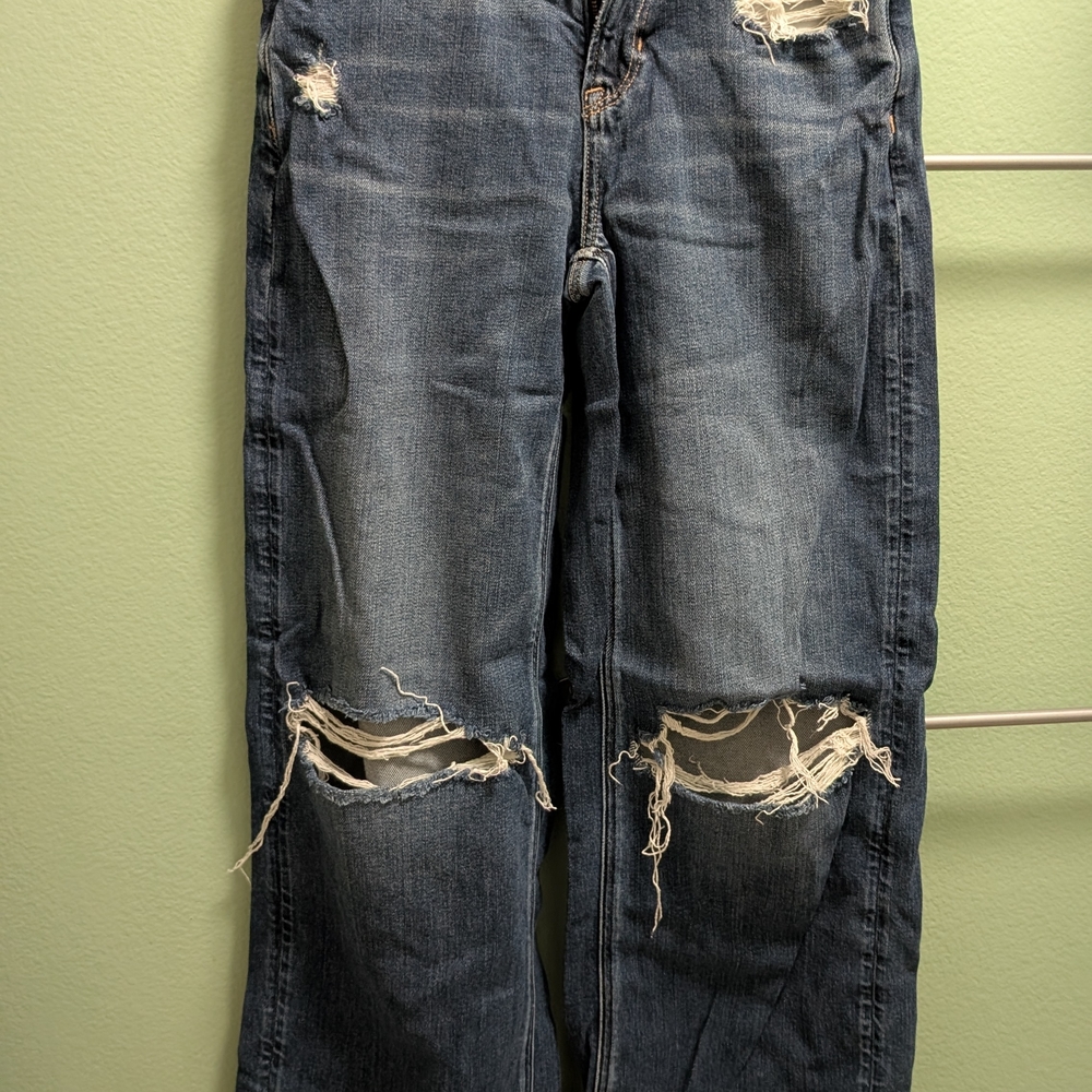 Distressed Blue Jeans